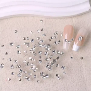 Silver rhinestones for nails in round and square shapes with French manicure