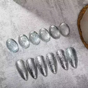 Diamond Gel Polish swatches in icy silver tones on stone surface