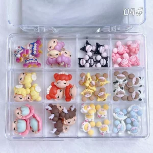 Sleepy doll head and character nail charms in resin pastel figures