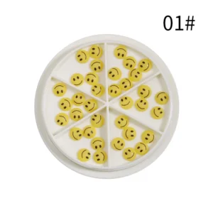 Yellow resin smiley face nail charms in segmented white tray – 01#