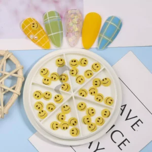 Nail art display using gold-trimmed resin smiley nail charms from 02#