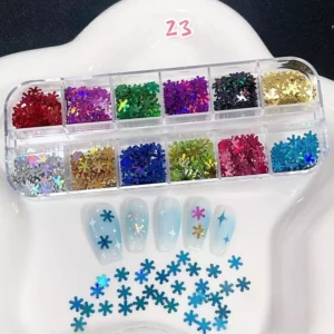 Snowflake glitter sequins in 12 dazzling colors with blue-tone winter nails