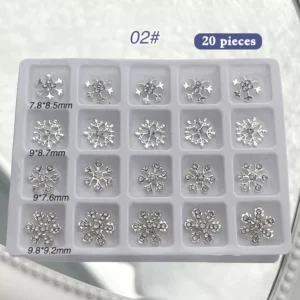 Silver Christmas nail charms in tray 02 featuring rhinestone snowflakes in assorted patterns