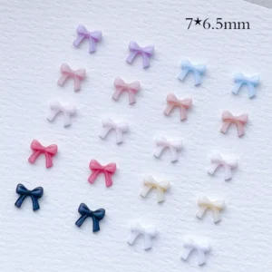 Set of 3D Ribbon Bow Nail Charms in matte pastel tones, 7×6.5mm sizing