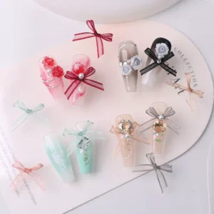 Assorted pastel bow charms paired with decorated artificial nails