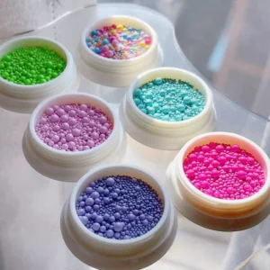 6 jars of solid-tone nail caviar beads including green, lavender, and hot pink