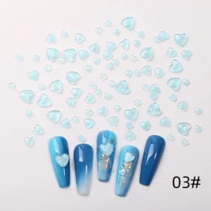 Light blue heart-shaped pastel nail decorations in mixed sizes
