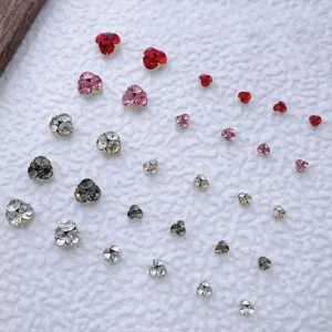 Loose sparkly nail art embellishments in multiple sizes and tones