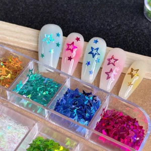 Star-shaped holographic nail glitter in pink, blue, and metallic tones