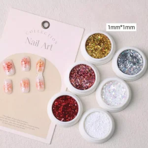 Set of star nail glitter in 6 holographic shades with orange gradient nail art shown