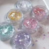 Starlit Opal Nail Glitter in six dreamy colors with crushed star flakes