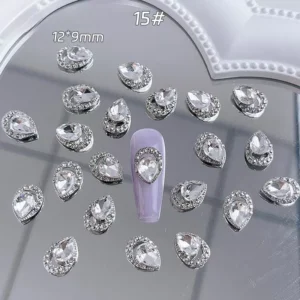 Teardrop-shaped clear crystal nail rhinestone with silver frame