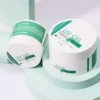 UV LED Professional Builder Gel in white and green packaging, 50ml and 100ml jars on pastel display