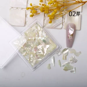 Natural white abalone shell nail flakes with iridescent ocean shimmer for elegant manicures