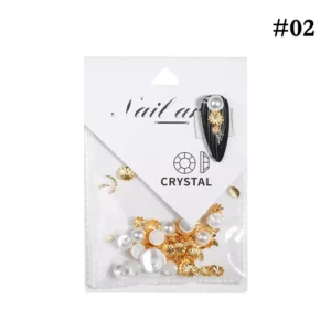 White pearl and alloy nail charms with gold sunburst design