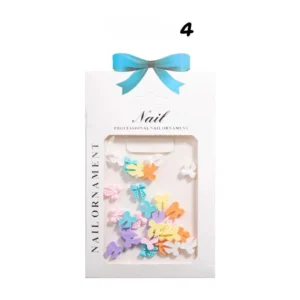 Long pastel bow nail charms with Y2K aesthetic in package