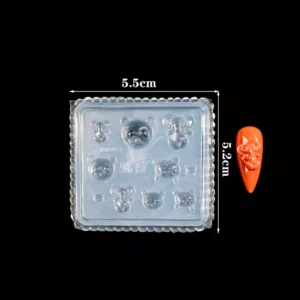 Square silicone mold with 3D bear heads and a resin-finished teddy nail charm