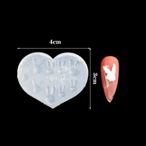 Bunny ear silicone nail mold with white rabbit design preview