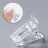 Crystal Nail Clamp securely holding a dual form in place for nail extension application