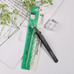 Curved Nail Art Tweezers packaging with Japanese text and floral decor