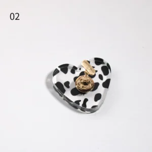 Heart-shaped cow print acrylic base with gold magnetic stand