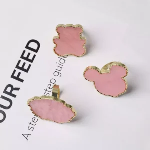Pink enamel nail palette trays in cloud, teddy bear, and cartoon shapes