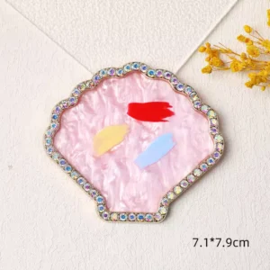 Gold floral nail display tray with pearl shell base