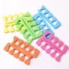 Heart toe separators in pink, green, yellow, orange, and blue foam for pedicure use