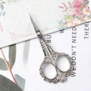 Stainless steel silver nail scissors with vintage handle pattern