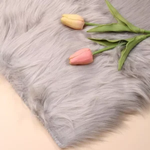 Light gray faux fur nail mat with realistic tulips on top