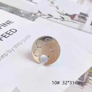 Silver round artist palette-shaped nail tray with wells