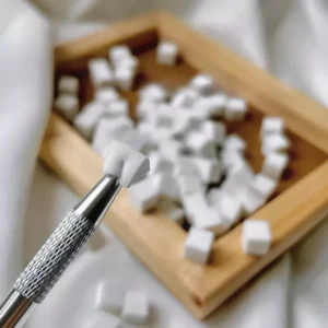 Sponge pickup tool gripping cube sponge for nail design work