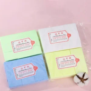 Four blocks of lint-free nail wipes in green, white, blue, and yellow