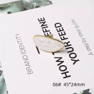 Long oval white pearl nail art palette with gold border