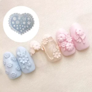 Heart-shaped silicone nail mold with 3D floral nail art samples