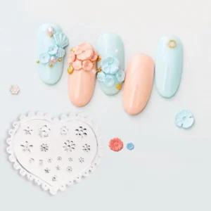 Heart-shaped gel nail mold and finished pastel 3D designs