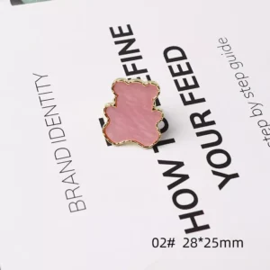 Pink teddy bear-shaped metal nail palette with gold edge