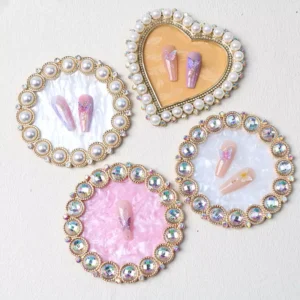 Decorative round and heart-shaped vintage nail trays with pearls and gems