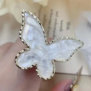 Butterfly nail color mixing ring worn on finger for application